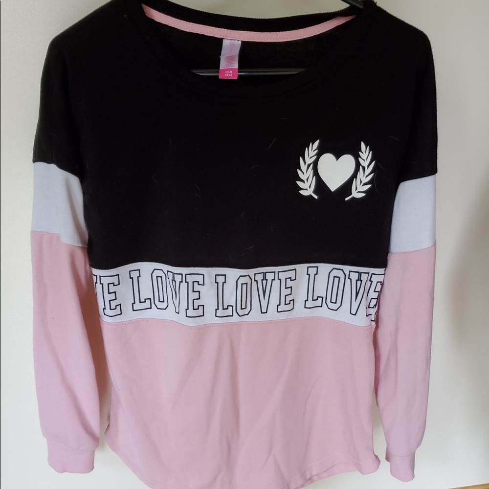 I’m selling a tri-color “love” long sleeve shirt!